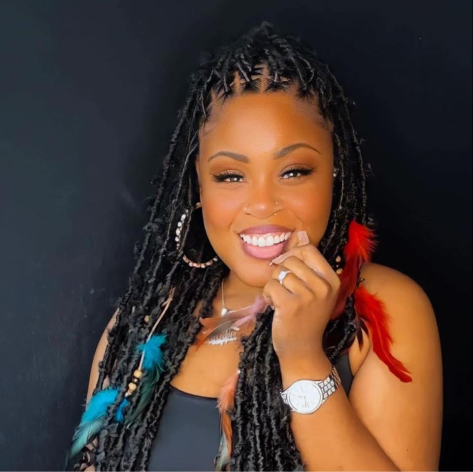 Portrait of LaShonda Tropikana Hatch smiling.