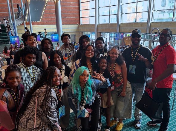 Students gathered together at a youth learning event.